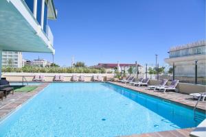 Bazén v ubytování Hotel Benini nebo v jeho okolí