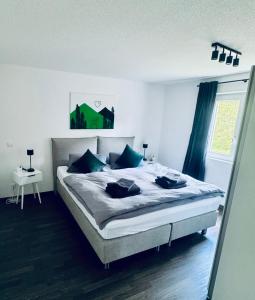 Postel nebo postele na pokoji v ubytování Soulmates Resorts - Feldberg