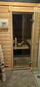 a glass door of a sauna in a house at Soulmates Resorts - Feldberg in Feldberg +35 photos