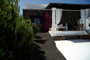 A garden outside UNIQUE Homes Lajares - Only Adults