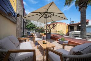 Posezení v ubytování Old Town Corner Luxury Studios