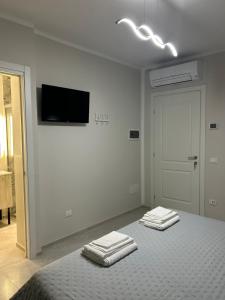 TV a/nebo společenská místnost v ubytování B&B Telko