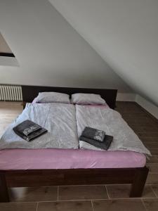 Postel nebo postele na pokoji v ubytování Apartmán Hugo