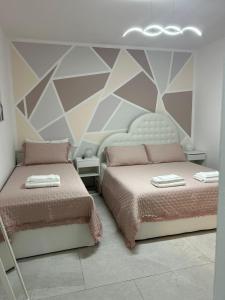 Postel nebo postele na pokoji v ubytování B&B Telko