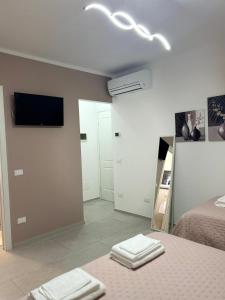 TV a/nebo společenská místnost v ubytování B&B Telko