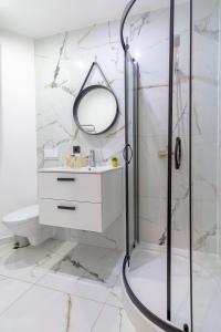 Koupelna v ubytování Podniebny Apartament
