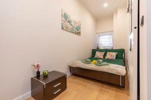 Postel nebo postele na pokoji v ubytování Podniebny Apartament