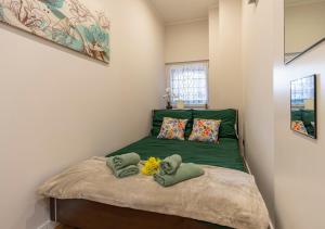 Postel nebo postele na pokoji v ubytování Podniebny Apartament