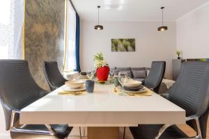 Posezení v ubytování Podniebny Apartament