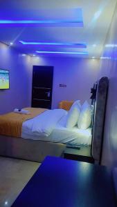 Postel nebo postele na pokoji v ubytování Preserve Hotel Ilupeju