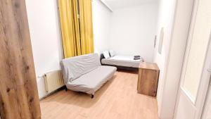 Posezení v ubytování Spacious Rooms - 15 Min from Airport & City Center, 5 Min from Vienna Main-Bus Station EZ7