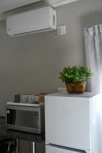Η κουζίνα ή μικρή κουζίνα στο Son Heuwel B&B room