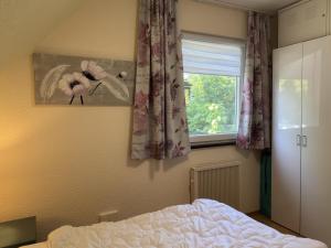 Ein Bett oder Betten in einem Zimmer der Unterkunft Apartment in Kellerwald near Edersee Lake