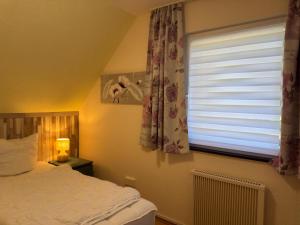 Ein Bett oder Betten in einem Zimmer der Unterkunft Apartment in Kellerwald near Edersee Lake
