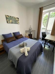 Postel nebo postele na pokoji v ubytování 2 spacious bedrooms near Riquier station!