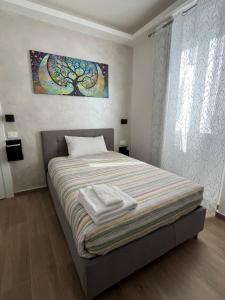 Postel nebo postele na pokoji v ubytování Sogni Di Luna