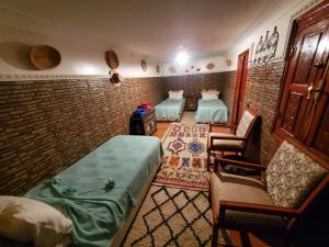 Cama o camas de una habitación en Riad Lalla Marrakech