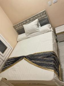 Postel nebo postele na pokoji v ubytování Halfmoon House