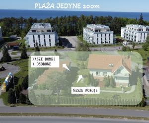 a model of a house and a home with buildings at Dom Gościnny Wiki in Rewal