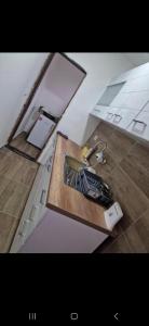 Kuchyň nebo kuchyňský kout v ubytování Relax apartman 01