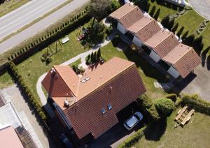 an overhead view of a house with a roof at Dom Gościnny Wiki in Rewal +61 photos