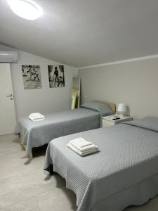 Postel nebo postele na pokoji v ubytování B&B Telko