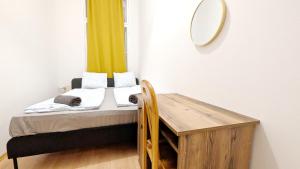 Postel nebo postele na pokoji v ubytování Spacious Rooms - 15 Min from Airport & City Center, 5 Min from Vienna Main-Bus Station EZ8