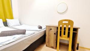 Postel nebo postele na pokoji v ubytování Spacious Rooms - 15 Min from Airport & City Center, 5 Min from Vienna Main-Bus Station EZ8