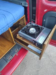 a table in the back of a van with a record player at Camper K Not for driving Playa las Vistas in Adeje +1 photo
