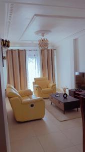 Posezení v ubytování MAISON SUISSE Emana Yaoundé, Appartements meublés de luxe