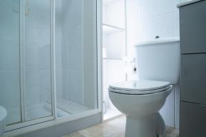 Kúpeľňa v ubytovaní Apartamento Faro da Rocha