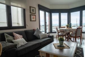 Posedenie v ubytovaní Apartamento Faro da Rocha