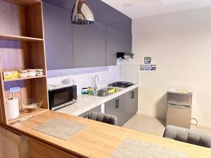 Η κουζίνα ή μικρή κουζίνα στο Rent Apartments Finch Nest