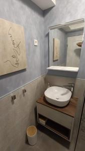 a bathroom with a sink and a mirror at Roko's in Hvar +13 photos