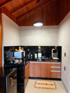Kuchyň nebo kuchyňský kout v ubytování Chalé Vista da Mata