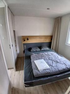 Postel nebo postele na pokoji v ubytování Mobilhome dans les Pins