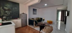 Kuchyň nebo kuchyňský kout v ubytování LEO Haute standing appartment S1 center ville Monastir