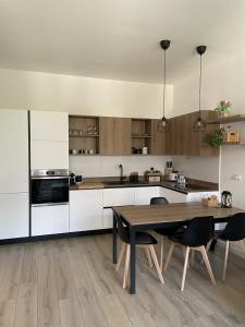 Kuchyň nebo kuchyňský kout v ubytování Pit Stop Apartment 2K23 - MXP - Busto Arsizio
