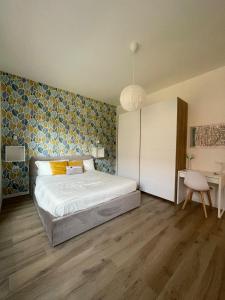 Postel nebo postele na pokoji v ubytování Pit Stop Apartment 2K23 - MXP - Busto Arsizio