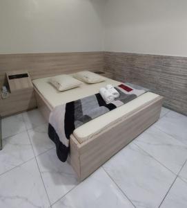 Postel nebo postele na pokoji v ubytování Hotel Caliente