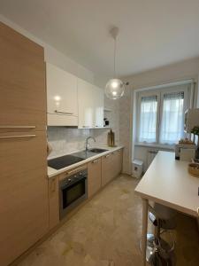 Kuchyň nebo kuchyňský kout v ubytování Pit Stop Apartment 2K21 - MXP - Busto Arsizio