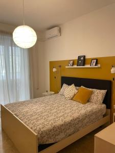 Postel nebo postele na pokoji v ubytování Pit Stop Apartment 2K21 - MXP - Busto Arsizio