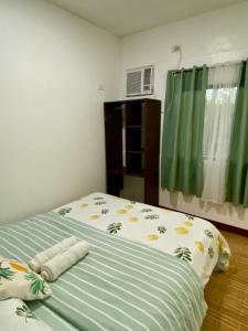 Postel nebo postele na pokoji v ubytování Moalboal Panagsama beach TopBudz Hostel