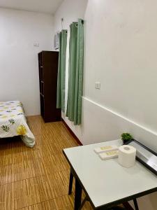 Postel nebo postele na pokoji v ubytování Moalboal Panagsama beach TopBudz Hostel