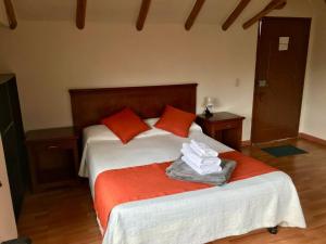 Postel nebo postele na pokoji v ubytování hotel el portal de las Flores, Alojamiento Rural