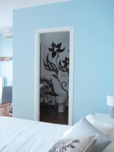 Postel nebo postele na pokoji v ubytování b&b I Limoni
