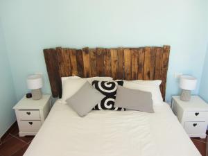 Postel nebo postele na pokoji v ubytování b&b I Limoni