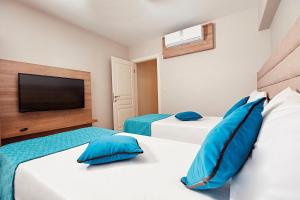 Bursa Suites Apart Otel客房内的一张或多张床位