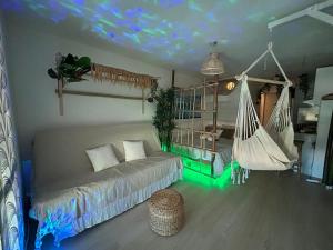 Postel nebo postele na pokoji v ubytování Les Cocotiers vue mer 250 m de plage