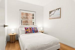 Ένα ή περισσότερα κρεβάτια σε δωμάτιο στο Coogee Crest - Relaxed Base between Randwick & Beach